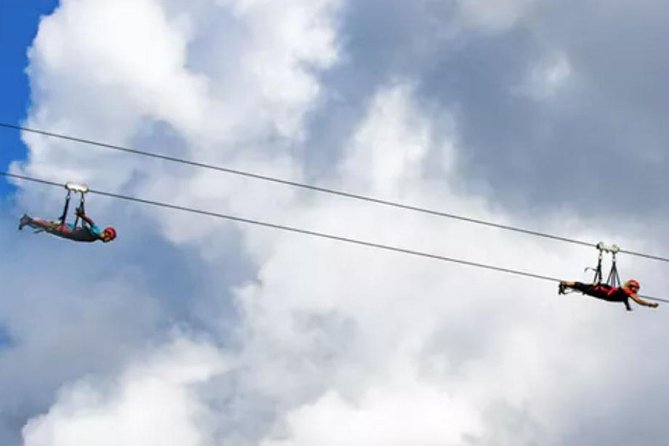 AdrenaLine Zipline Tour with WaterZip by Outfitters Kauai - FlyLine Kauai Superman run: headfirst, long, and fast