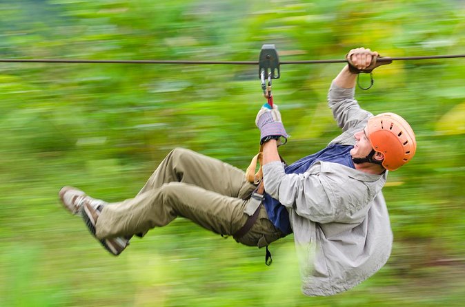 Arenal Volcano Combination Tour: Zipline, Tubing and Hot Springs - Ziplining Over the Forest: Platforms, Lines, and a Hanging Bridge