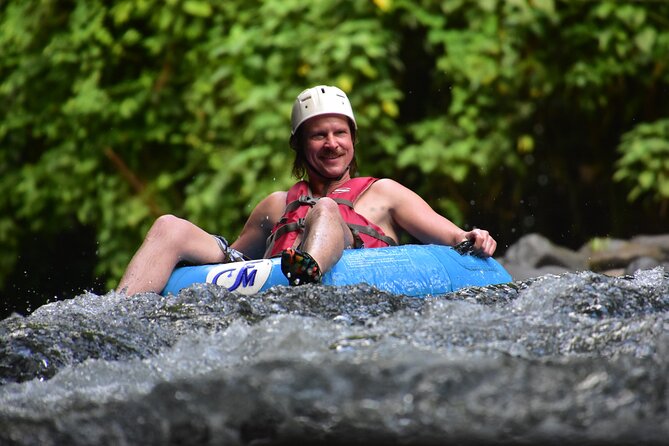 Arenal Volcano Combination Tour: Zipline, Tubing and Hot Springs - Tubing the Arenal River Rapids: Adrenaline With Safety Coaching