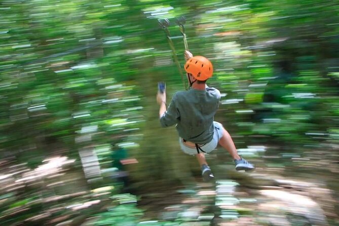 ATV Cenote and Zipline Sacred Jungle Expedition - Cenote swim and cave quiet: bats, cool water, and muddy reality