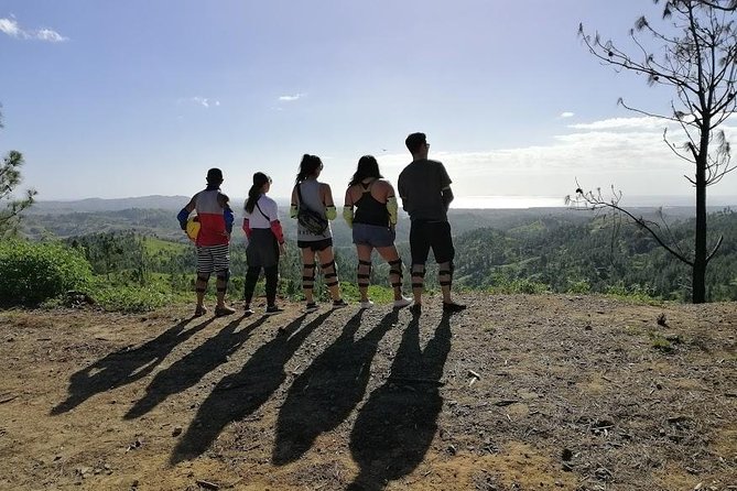 ATV Quad Bike and Zip Line Adventure Tour (Departs Nadi) - Nausori Highlands on a quad: mud, cane fields, pine, and the Mamanuca view