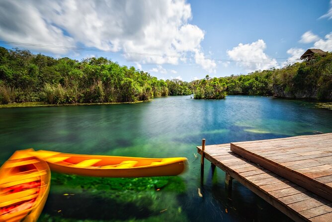 Cenote Tankah and Mayan Village Tour with Zipline, Canoes & Lunch - Ziplining Above the Canopy: Short Flight, Big Reward