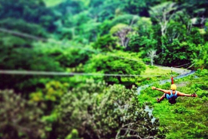 Jaco Jungle Zipline & Waterfall Tractor Tour - Tractor ride into a private 850-acre river valley